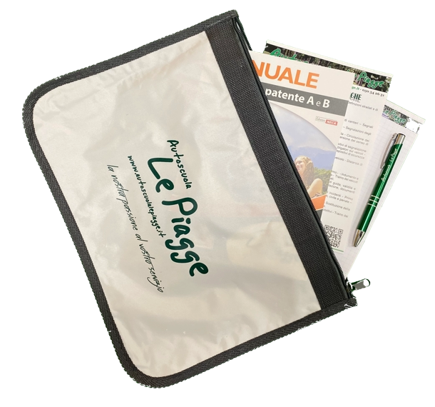 The driving school bag with manual, notepad and pen