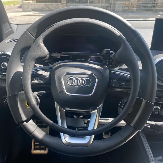 Accelerator ring behind the steering wheel